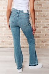 Hazel Blues® | Isla Mid Rise Distressed Released Hem Bootcut Jeans