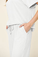 Hazel Blues® | Double Take Texture Round Neck Short Sleeve T-Shirt and Wide Leg Pants